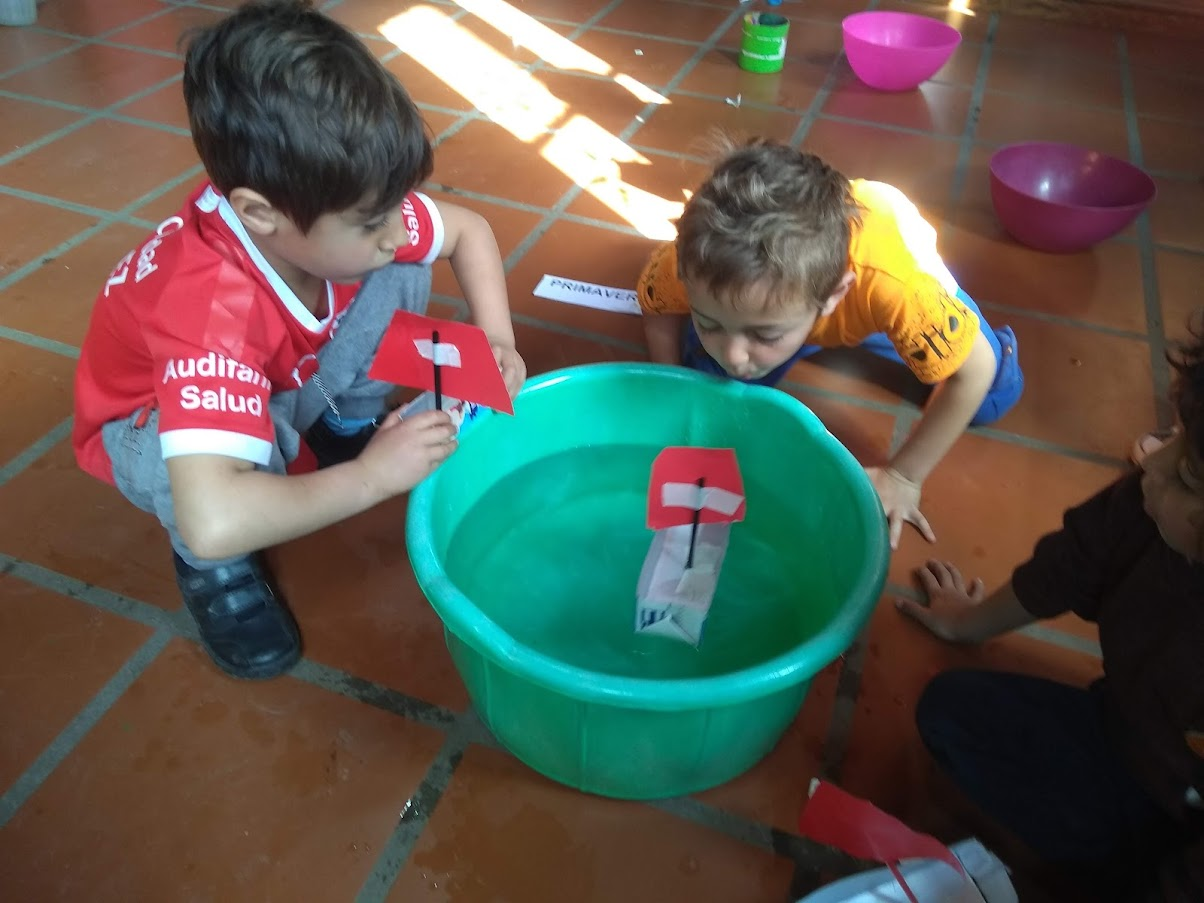 Students testing toy boats